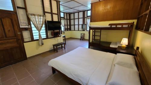 Letto o letti in una camera di Sepilok B&B