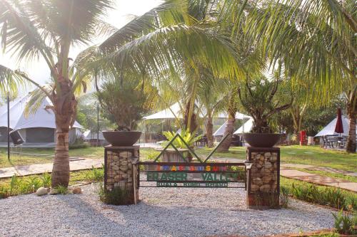 a sign in front of a park with palm trees at Fraser Valley Kuala Kubu Bharu in Kuala Kubu Baharu