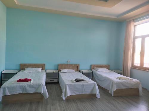 Cama o camas de una habitación en RONG YAO House