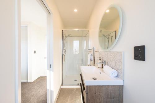 a bathroom with a sink and a mirror at 37 Galaxy A in Lake Tekapo