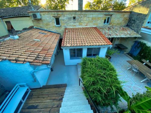 an overhead view of a house with a roof at The Loft Factory 4 Chambres Vue Garonne + Jardin in Lormont