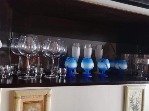 a group of wine glasses sitting on top of a counter at Dellmar Apartment in Perea