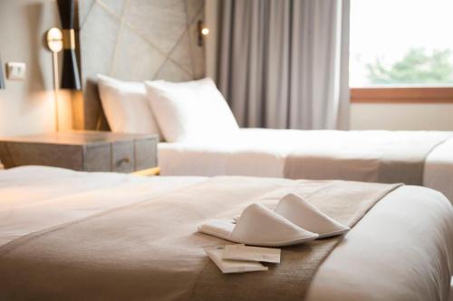 Cama o camas de una habitación en Hotel Cabo De Hornos