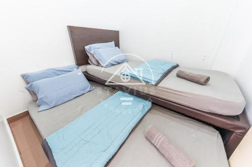 Postel nebo postele na pokoji v ubytování 1-10Pax Port Dickson Glory Beach Resort Seaview