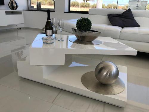 a living room with a table with a silver ball on it at Villa private Siracusa luxury in Augusta