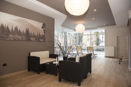 Χώρος καθιστικού στο Aparthotel Wellness Villa di Bosco