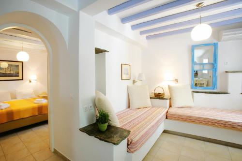 Letto o letti in una camera di Golden Beach Studios & Suites