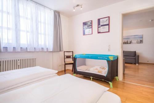 Postel nebo postele na pokoji v ubytování Appartement Rathausplatz