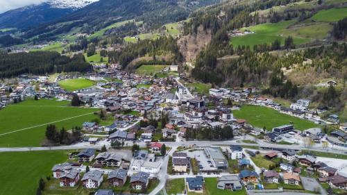 an aerial view of a village in the mountains at Ludwighaus in Neukirchen am Großvenediger