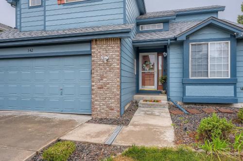 a blue house with a blue garage at 342 English Sparrow Dr in Highlands Ranch