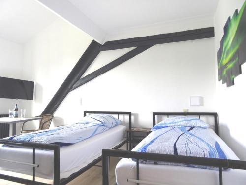 Cama o camas de una habitación en Eventhotel Ö - Cappuccino