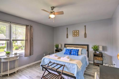 a bedroom with a bed and a ceiling fan at Swansboro Coastal Home Less Than 3 Mi to State Park! in Swansboro