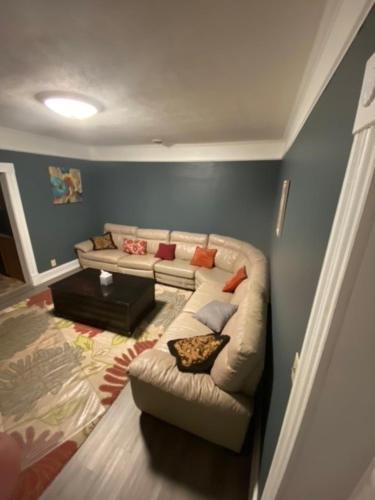 a living room with a couch and a table at Southern Charm in Cadiz