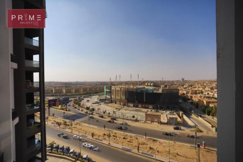 - Vistas a la ciudad desde un edificio en Prime Select Porto New Cairo en El Cairo
