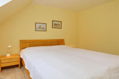 Postel nebo postele na pokoji v ubytování Residenz Seestern Wohnung 45