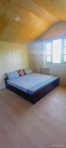 Postel nebo postele na pokoji v ubytování The City Escape Farmstay