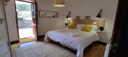 Letto o letti in una camera di Alojamiento rural, jardín, a 25 minutos de Bilbao, parking gratuito