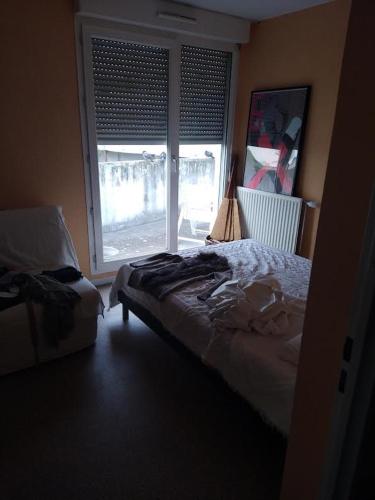 Postel nebo postele na pokoji v ubytování Lyon Guillotière
