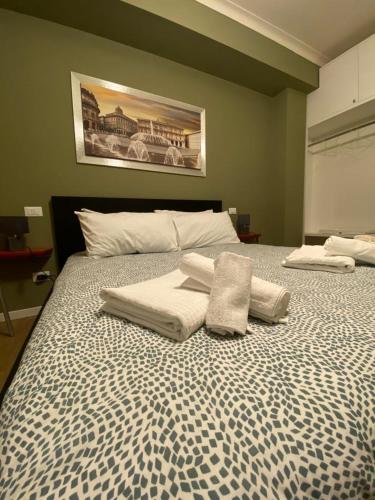 Ein Bett oder Betten in einem Zimmer der Unterkunft B&B Fossatello affittacamere