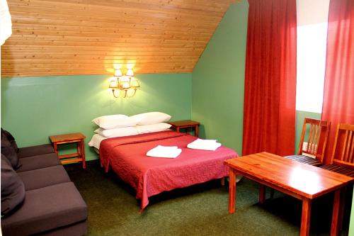 Кровать или кровати в номере Voore Guesthouse