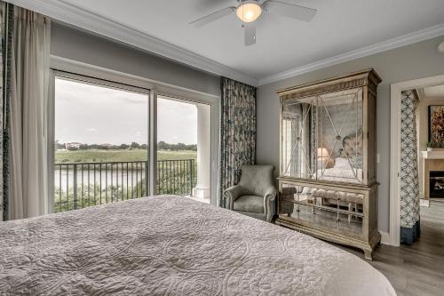 a bedroom with a bed and a large window at Marina Inn 4-303B in Myrtle Beach