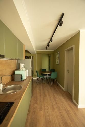 Η κουζίνα ή μικρή κουζίνα στο Oliv Residence