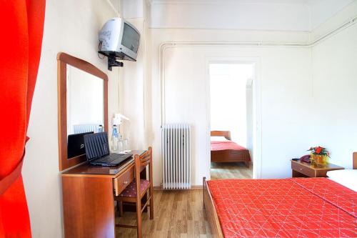 Un ou plusieurs lits dans un hébergement de l'établissement Keletron Hotel - Bike friendly hotel