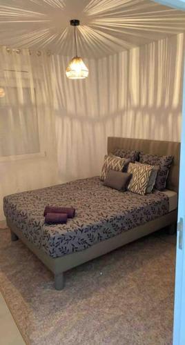 Zona de estar de Sandspa logement avec jacuzzi