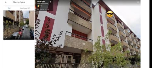 a building with a face painted on the side of it at Hikoa Hendaia-Hendaye plage in Hendaye