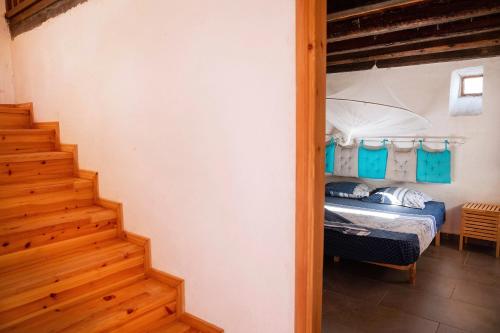 Lova arba lovos apgyvendinimo įstaigoje Rustic Holiday Villa Upper Qeparo