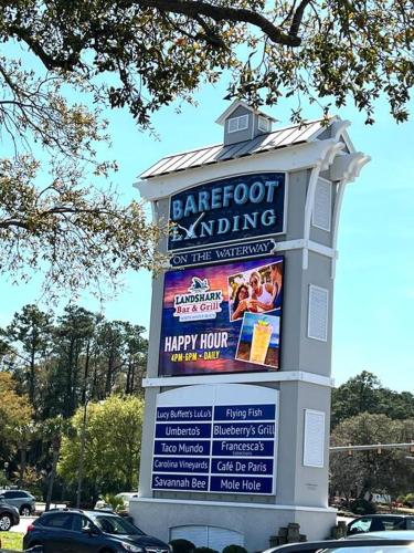 a large sign for a baroptoit laughing at Walk to the Beach-Sleeps 10 and Golfcart in Myrtle Beach