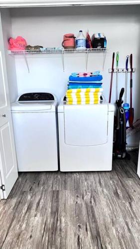 a kitchen with two white refrigerators in a room at Walk to the Beach-Sleeps 10 and Golfcart in Myrtle Beach