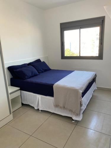 Ένα ή περισσότερα κρεβάτια σε δωμάτιο στο Sossego Beira Mar