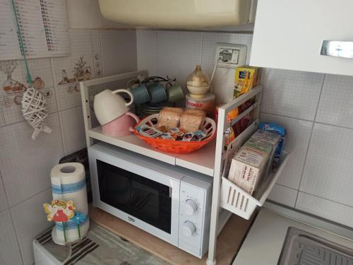 Kuchyň nebo kuchyňský kout v ubytování Casa al Mare Fontespina