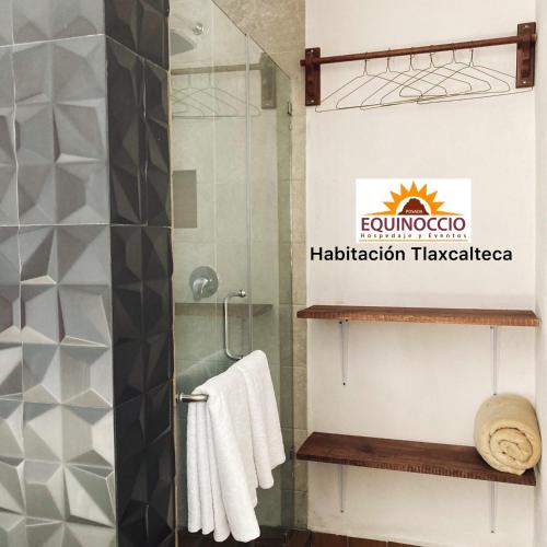 a bathroom with a shower and a sign that reads hacienda installation therapy at Posada Equinoccio in Bernal