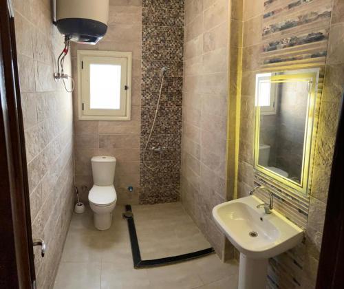 A bathroom at Bahga Palace 4 Residential Apartments