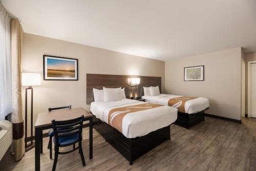Postel nebo postele na pokoji v ubytování Quality Inn