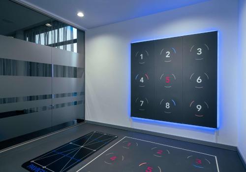 an empty room with a walkway with an abacus at elaya hotel kevelaer in Kevelaer