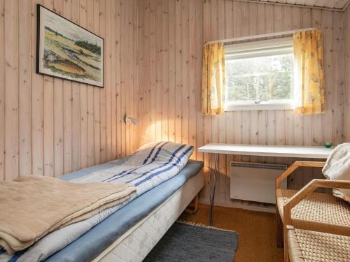 Postel nebo postele na pokoji v ubytování Holiday home Pandrup XVIII