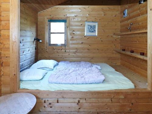 Cama ou camas em um quarto em Holiday home Hadsund CIII