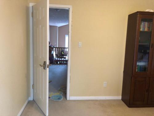 an open door to a room with a hallway at HB Guest Home in Waterloo