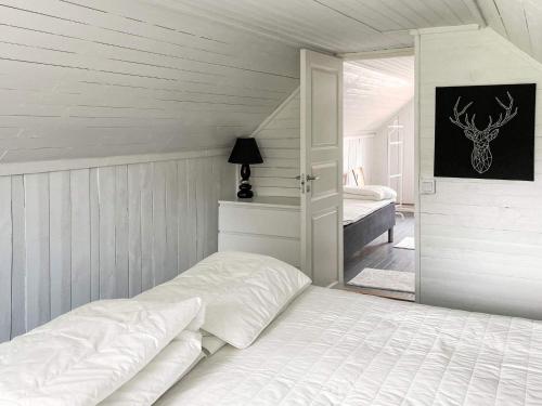 Katil atau katil-katil dalam bilik di Holiday home KARLSKRONA III