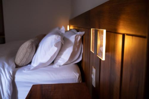 Katil atau katil-katil dalam bilik di Villa Boréal Hostellerie Pousada Boutique