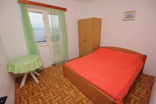 Posteľ alebo postele v izbe v ubytovaní Seaside secluded apartments Cove Torac, Hvar - 589