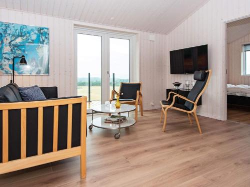TV a/nebo společenská místnost v ubytování Holiday home Glesborg CXXVI