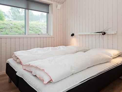 Krevet ili kreveti u jedinici u okviru objekta Holiday home Glesborg CXXVI