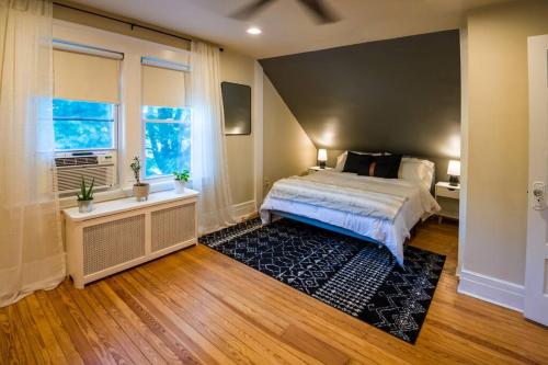 a bedroom with a large bed and a window at Immaculate, Newly Renovated 1 Bedroom Apt Near NYC in Hawthorne