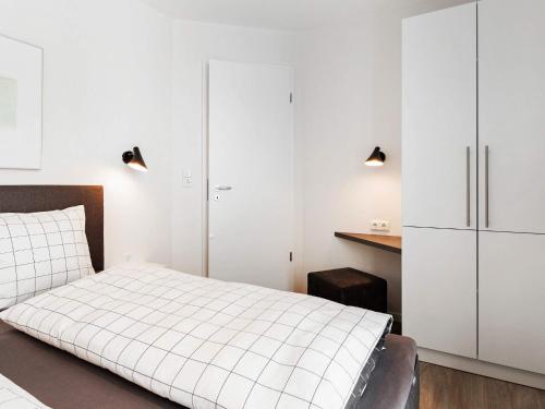 Cama o camas de una habitación en 6 Personen Ferienhaus in Wendtorf