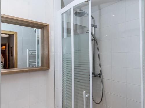 a shower with a glass door in a bathroom at Appartement Val-d'Isère, 5 pièces, 8 personnes - FR-1-518-104 in Val-d'Isère