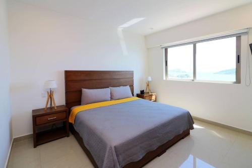 Ένα ή περισσότερα κρεβάτια σε δωμάτιο στο Departamento en renta en Gavias Grand Luxury